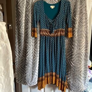 24. Boho styled dress with bow front